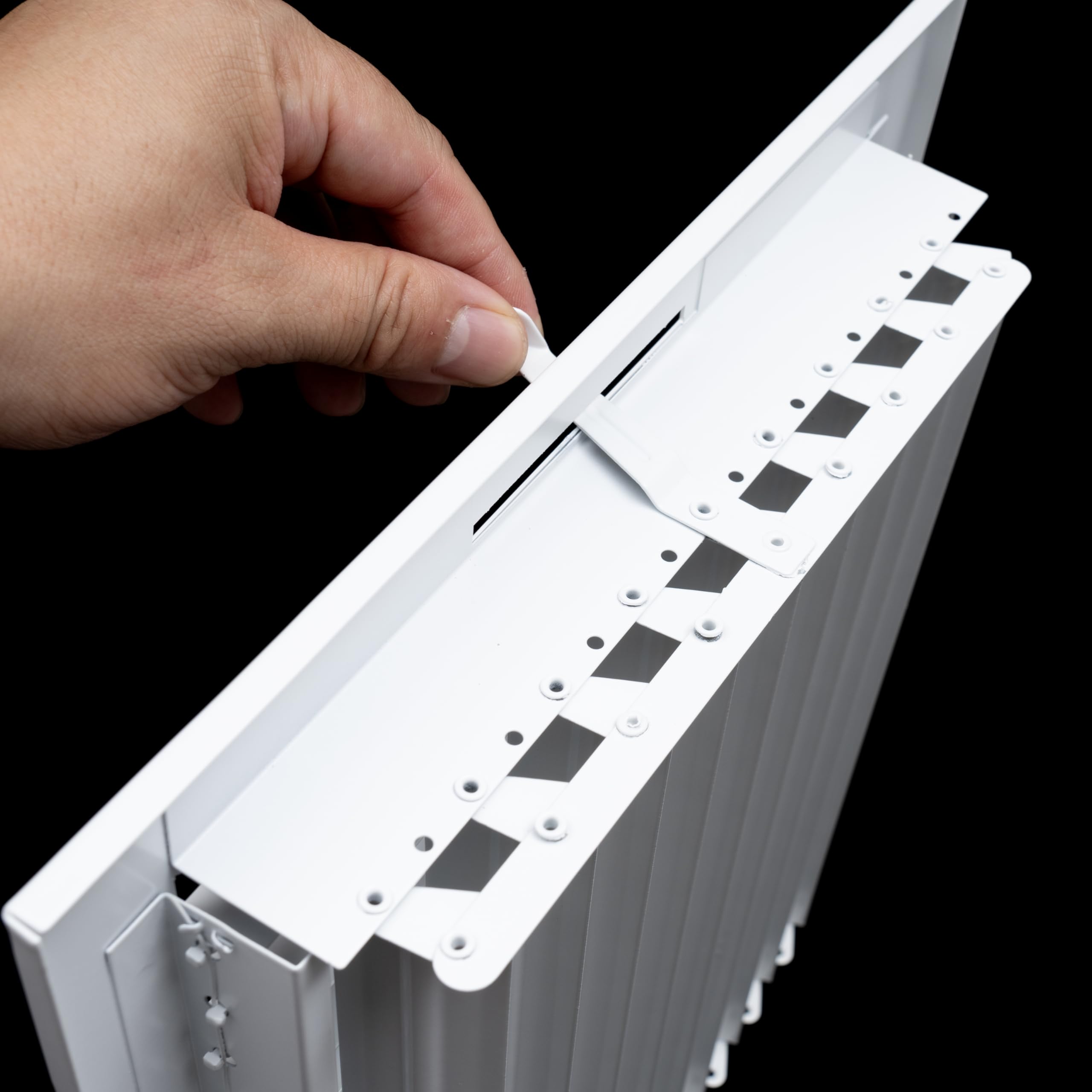 10 x 8-inch White Steel adjustable supply register, damper adjustment in use