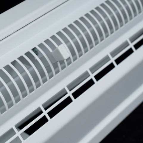 48" White Steel corner baseboard supply register, damper lever detail