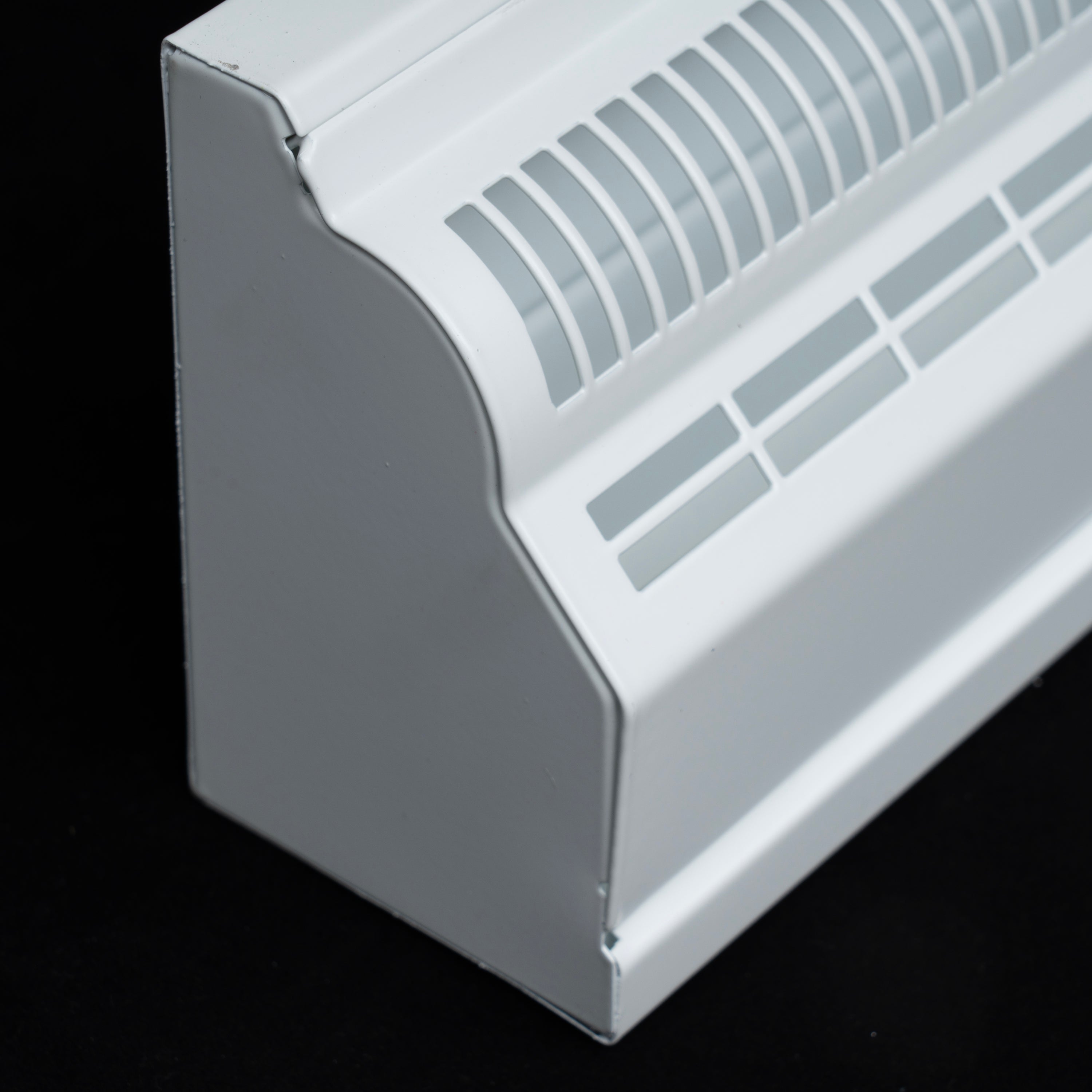 48" White Steel corner baseboard supply register, frame corner detail