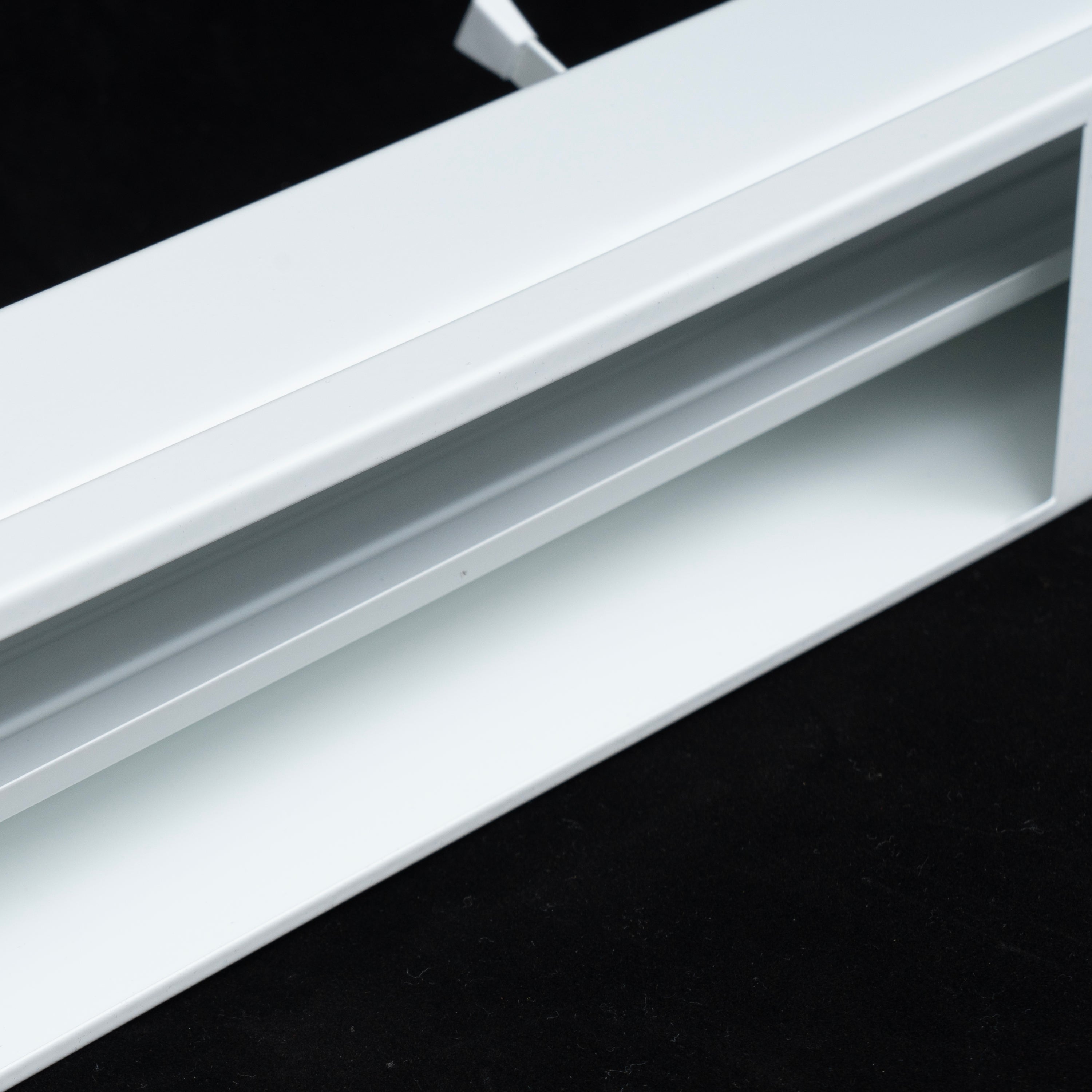 48" White Steel corner baseboard supply register, frame profile detail