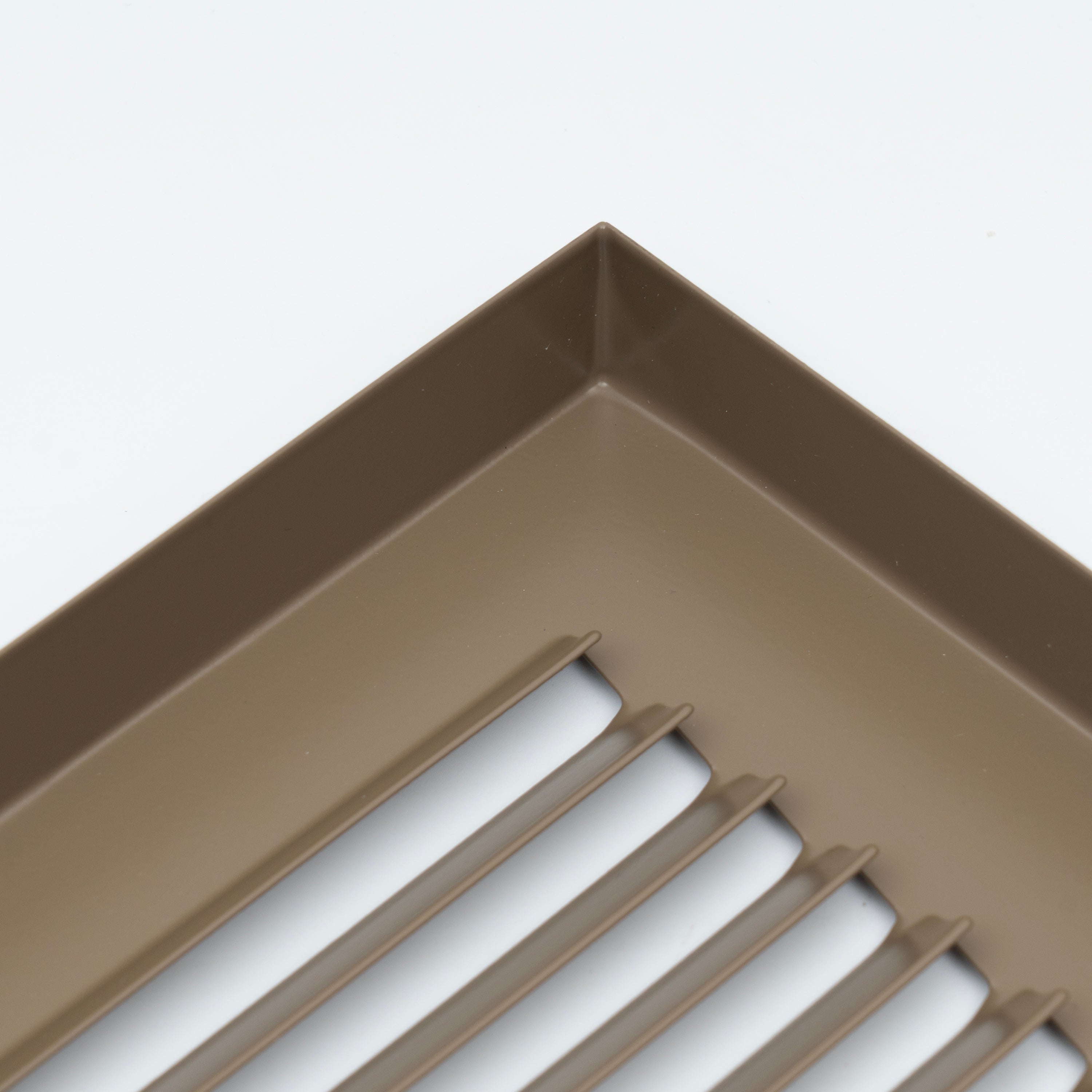 14 x 8-inch Brown Steel baseboard return grille, frame corner detail