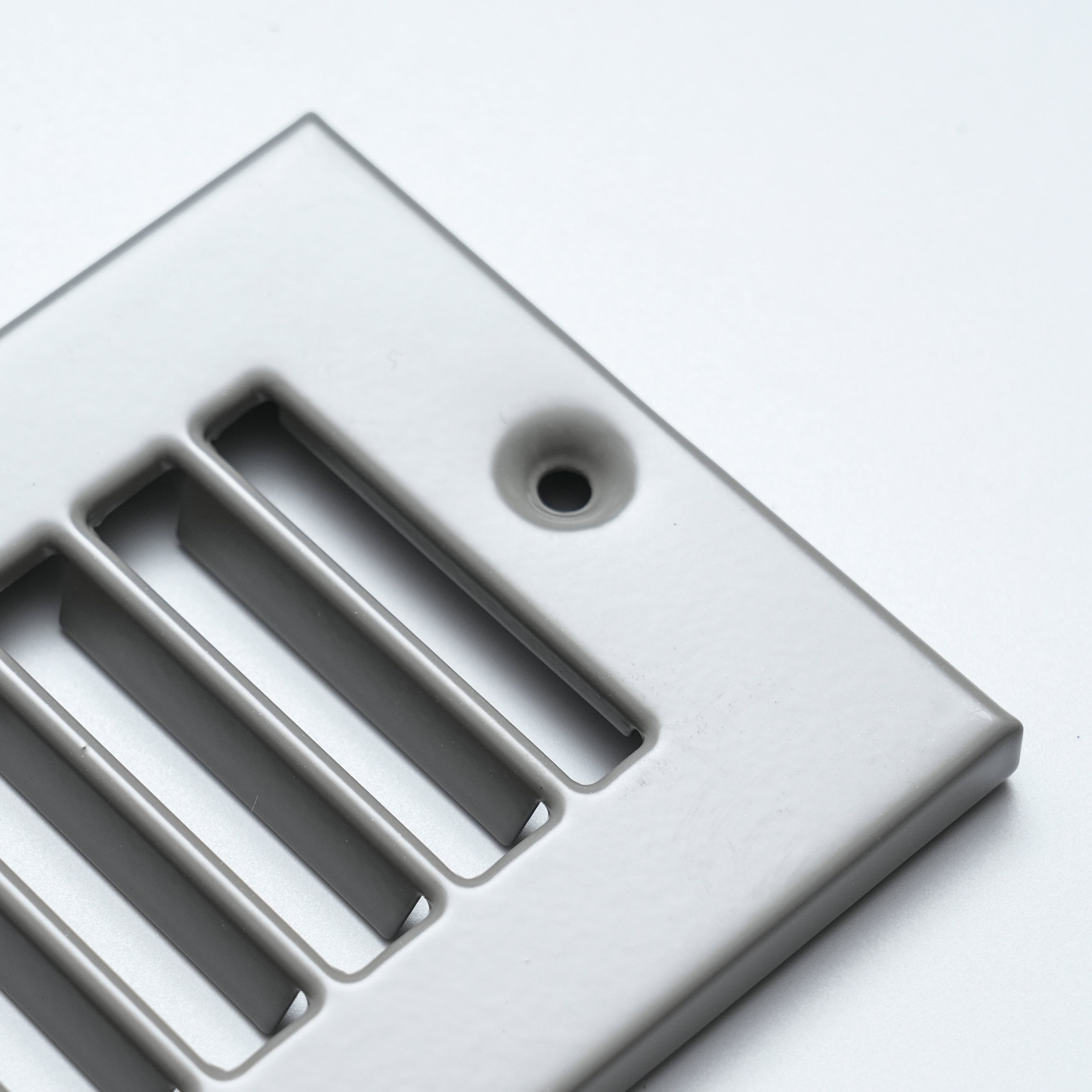 2 x 12-inch Gray Steel toe kick register, mounting screw detail